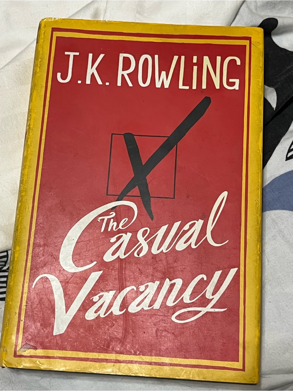 J.K. Rowling “The Casual Vacancy” Book - Hard Cover Red & Yellow
